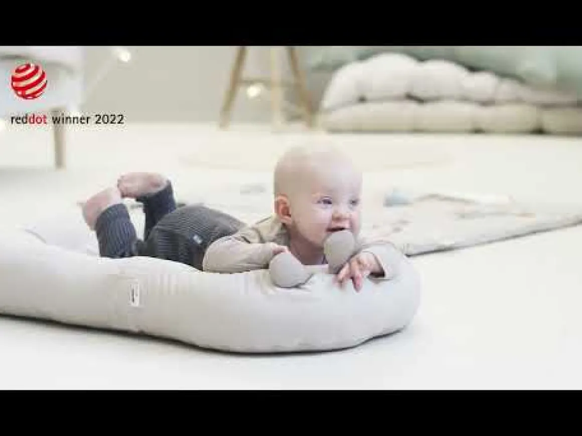 Cozy lounger with activity arch - Raffi - Sand